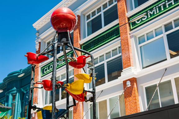 Looking up at the Bucket Fountain during the day, an iconic kinetic sculpture located in Cuba Mall in Wellington.