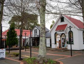 The screen location of Greytown, a historic small town featuring Victorian buildings,  stables, colonial cottages, and rural landscapes surrounding.