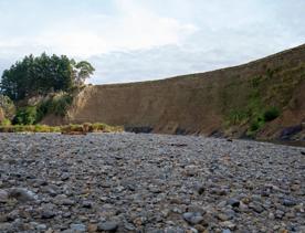 The screen location of Te Mārua  cliffs, where a river flows against vertical cliffs on the foothills of the Remutaka Range.