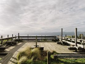 The wooden platform at the summit of Lookout Loop Walk at Wrights Hill on a cloudy day.
