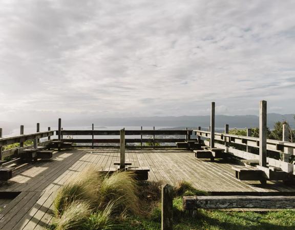 The wooden platform at the summit of Lookout Loop Walk at Wrights Hill on a cloudy day.