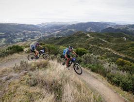 Two cyclists participate in a mountain bike race as part of Faultline Ultra.