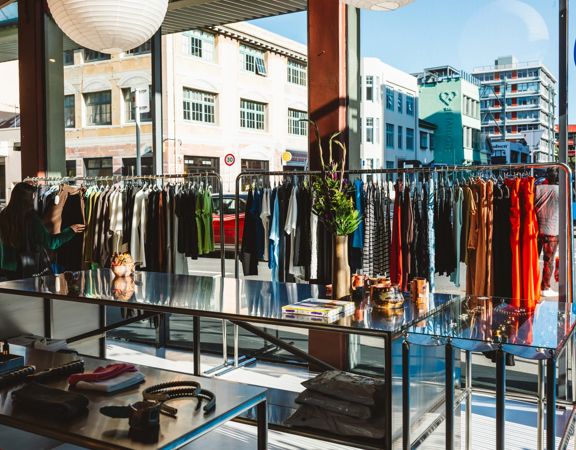Racks of clothes are positioned in front of Sully's shop windows, looking out on Ghuznee Street.