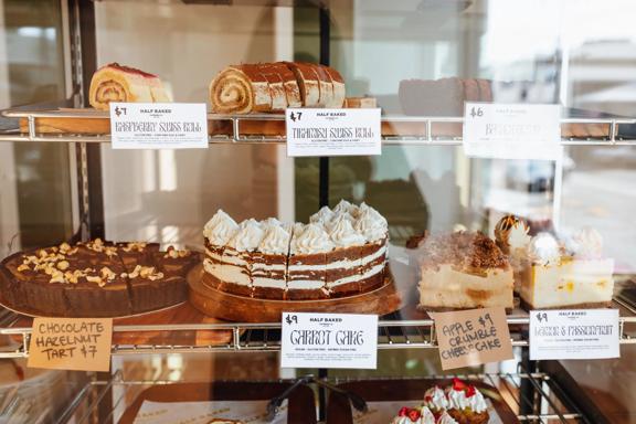 An assortment of desserts is on display at Half Baked.