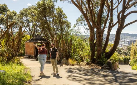 Two people at the Wellington Zoo on a sunny summer's day.