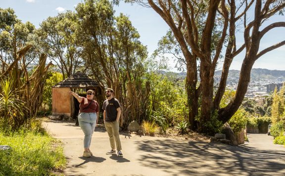 Two people at the Wellington Zoo on a sunny summer's day.