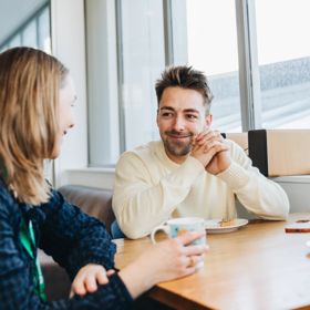 Two people talking at Taiawa Tech Hub