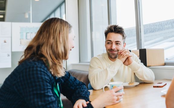 Two people talking at Taiawa Tech Hub
