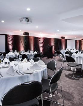 A large conference room inside Mövenpick Hotel Wellington.