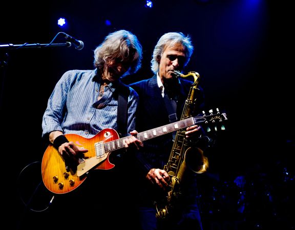A photo of The Dire Straits Experience performing on stage at The Opera House, Wellington