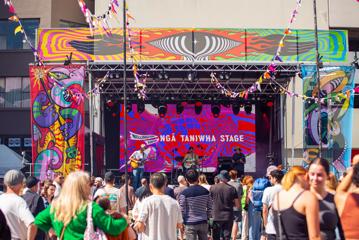 A colourful stage during an outdoor concert during CubaDupa, an annual street festival in Wellington.