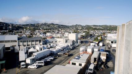A drone shot of Stone Street Studios, where trailers and cars are parked up.
