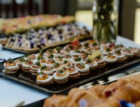 A table of nibble platters inside Zealandia Venues.