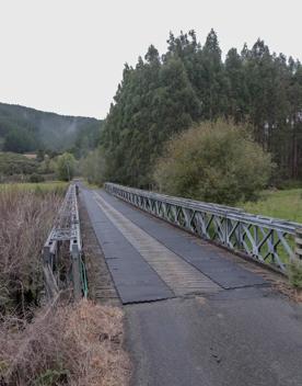 The screen location of Whiitemans Valley, nestled among trees and hills, old buildings have been built to mimic an old town.