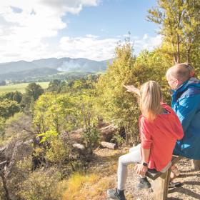 A family points at the view from Fensham Reserve in Wairarapa.