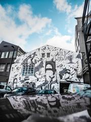 The exterior wall of Wild Workshop, Garage Project’s second brewery in Wellington. The large, industrial building is covered in a black and white mural by local street artist, Cracked Ink to depict the story and activity of the Wild Brewery.