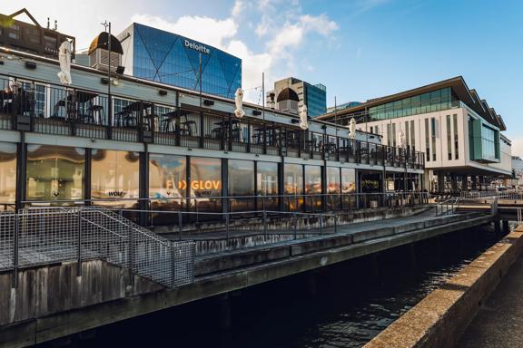The exterior of Foxglove Bar & Kitchen, a restaurant located on Queens Wharf at Wellington's waterfront.