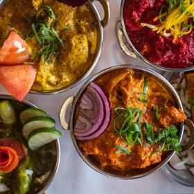 Close up of meals served at Geat India, with vibrant colours.