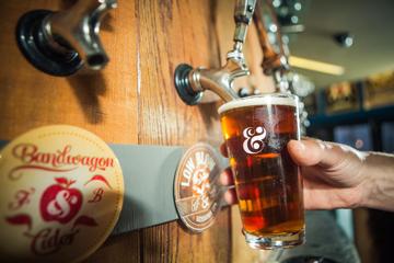 A pint of beer being poured at Fork & Brewer.