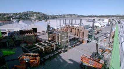 In the back area of Stone Street Studios, where large materials for creating sets are being moved around by machinery.