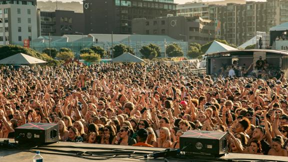 A crowd of thousands enjoys the performers on stage at Jim Beam home Grown 2023.