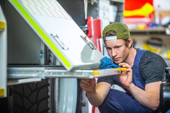 A fraser Engineering worker checking over their work.