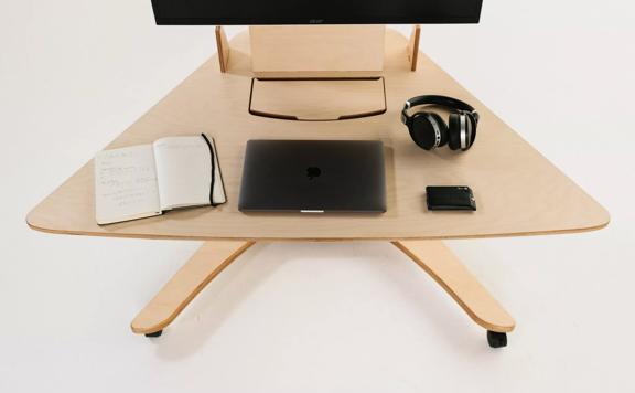 The Limber desk, with computer accessories on it.