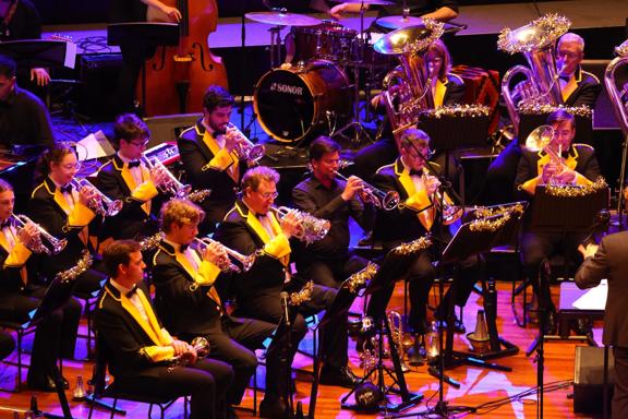 Brass band playing on stage.