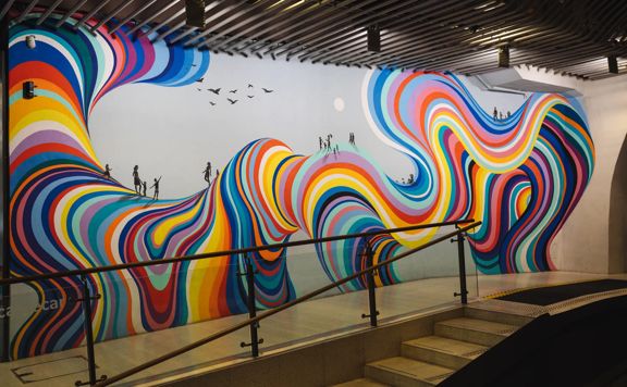The Cable Car Rainbow mural by artist Gina Kiel.