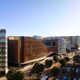 A drone shot of the Tākina Wellington Convention & Exhibition Centre located at 55 Cable Street, Te Aro, Wellington.
