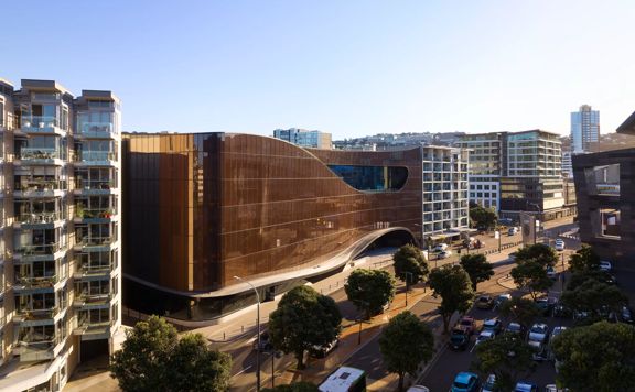 A drone shot of the Tākina Wellington Convention & Exhibition Centre located at 55 Cable Street, Te Aro, Wellington.