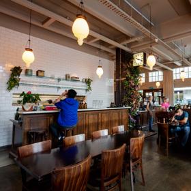 People dining inside Floriditas, a restaurant on Cuba Street in Te Aro Wellington. 