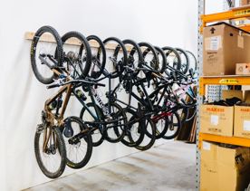 Row of mountain bikes hanging in bike storage at Zerode