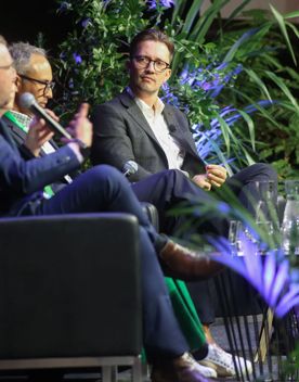 Three speakers on a panel at Life Sciences Summit 2025.