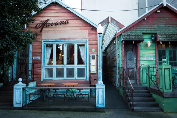 The front facade of Havana Bar, situated in colourful and cosy historic cottages located on Wigan Street in Te Aro, Wellington.