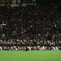 The All Blacks New Zealand rugby team stand, arm in arm, during the All Blacks v Australia Lipovitan-D Rugby Championship match, Sky Stadium, Wellington, New Zealand, Saturday, 28 September 2024.