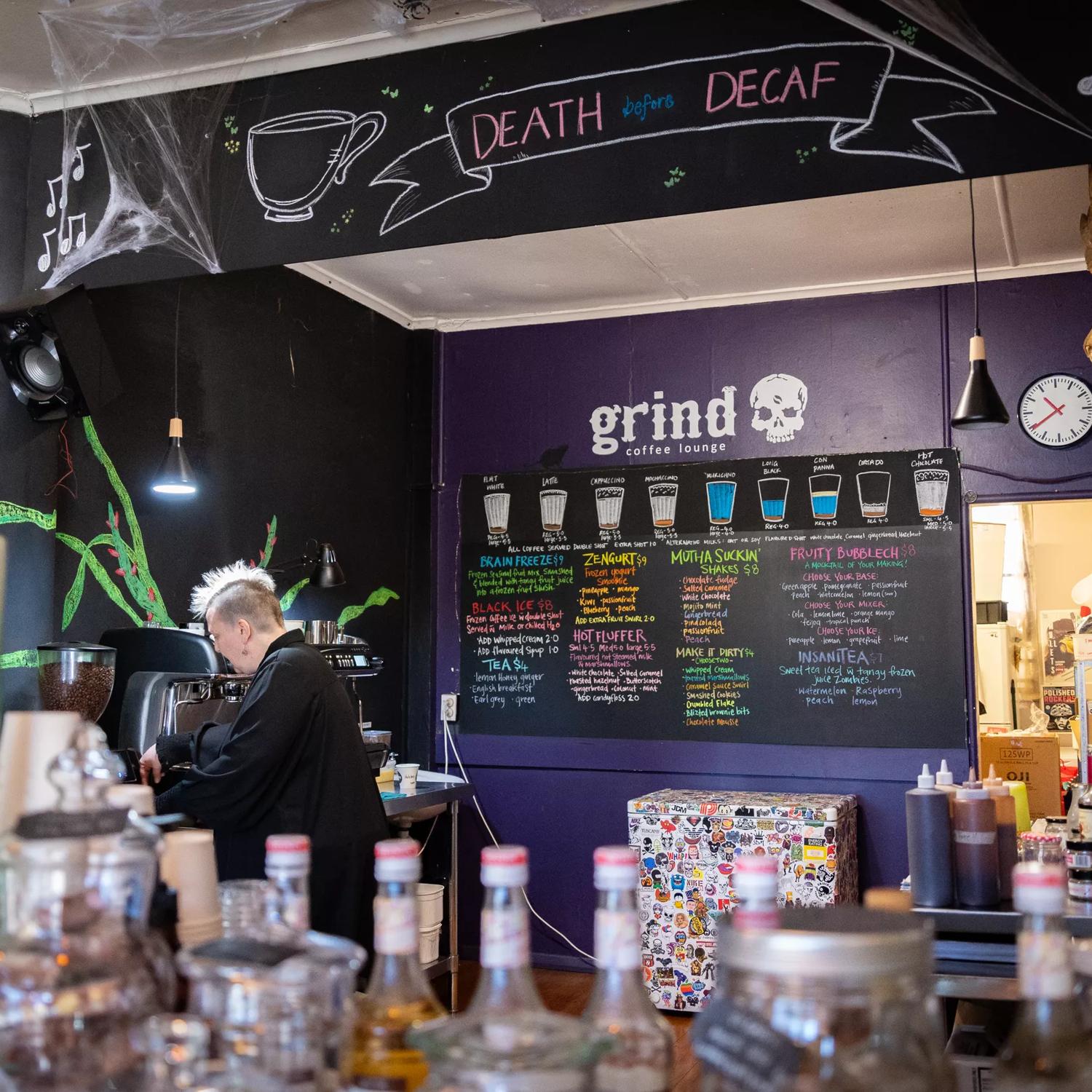 The dark themed interior of Grind Coffee Lounge Upper Hutt.
