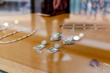 A close-up of jewellery sitting behind glass in Wilson Trollope.