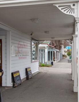 The screen location of Greytown, a historic small town featuring Victorian buildings,  stables, colonial cottages, and rural landscapes surrounding.