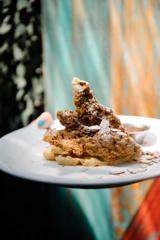 A plate of chicken and waffles served at Fidel's cafe.