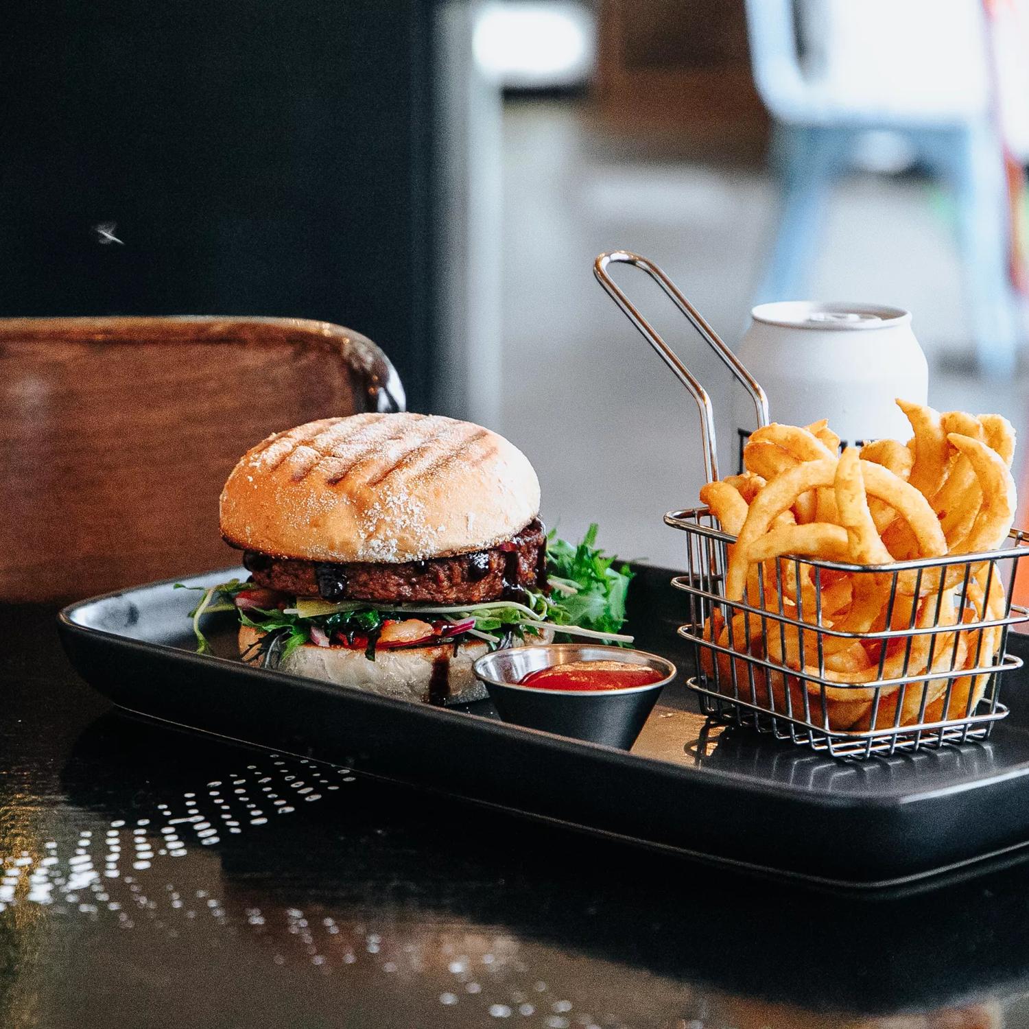 Burger and fries served at Get Fixed Bicycle Cafe Porirua.