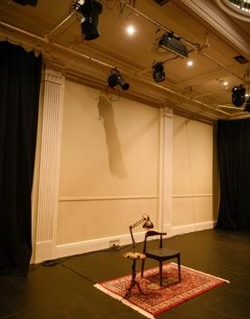 The gold and red interior of Bats Theatre.