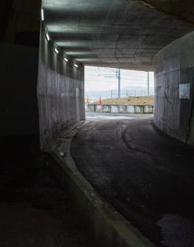 The urban setting of the Hutt Road Ngauranga Interchange, where highways got over tunnels with walls that once had graffiti.
