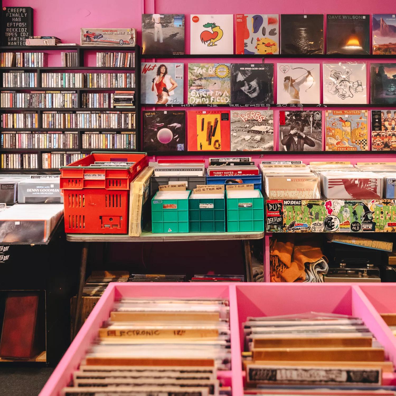 The interior of Creeps Record Parlour, a quirky record store with pink walls located in Newtown, Wellington, New Zealand.