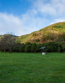 The screen locations of Catchpool Valley, with the river, lush bush,  forest, and grassland.