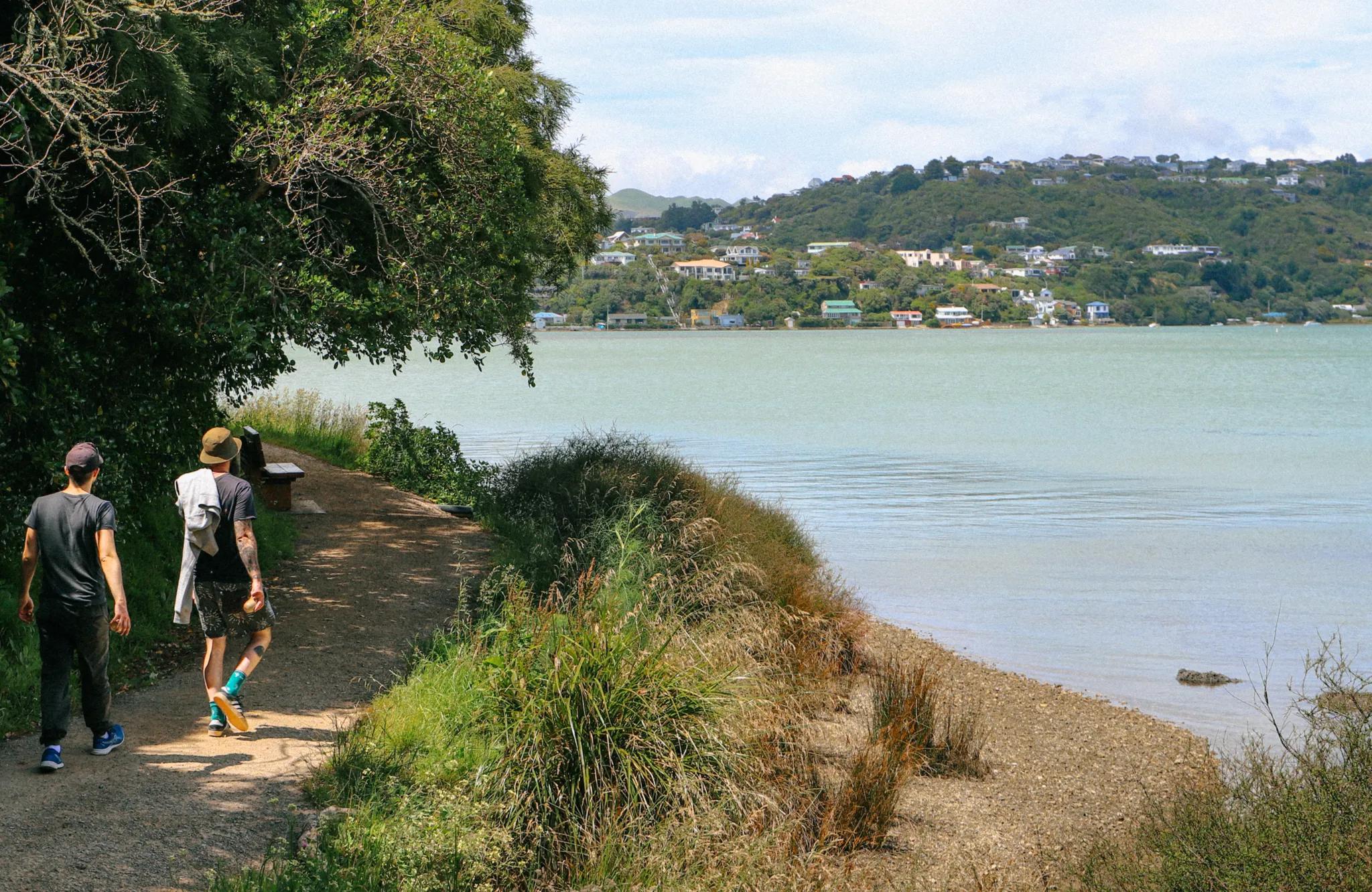 Two people walking on the Camborne Walkway trail.