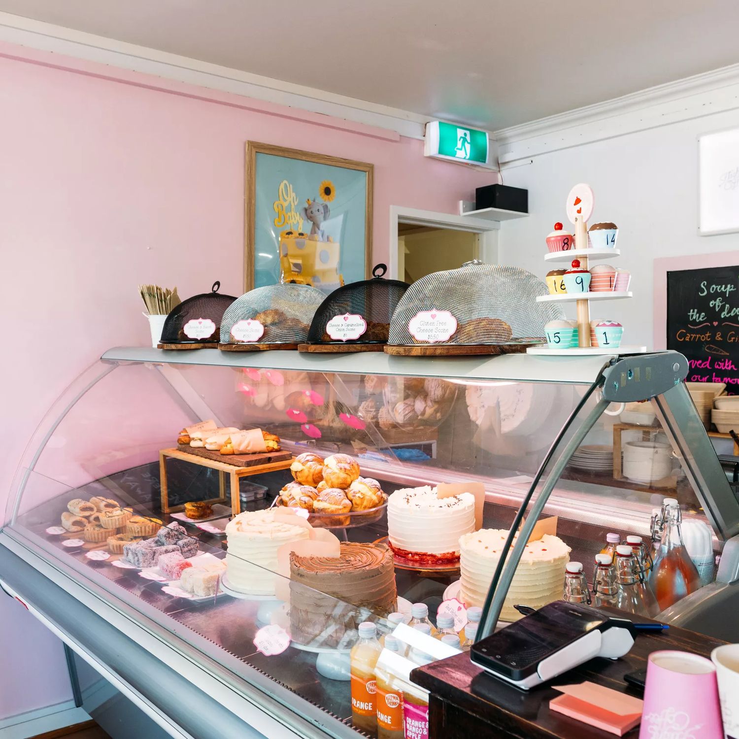 Inside The Cake Café, a bakery specialising in filled cupcakes, cheesecakes, brownies, cookie sandwiches, and giant, custom-made cake creations in Plimmerton, New Zealand.