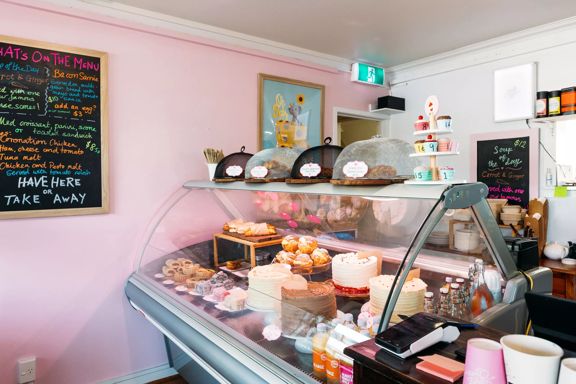 Inside The Cake Café, a bakery specialising in filled cupcakes, cheesecakes, brownies, cookie sandwiches, and giant, custom-made cake creations in Plimmerton, New Zealand.
