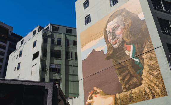 The Rita Angus portrait by artist Elliot O’Donnell (Askew One) overlooking Willis Street in Wellington.