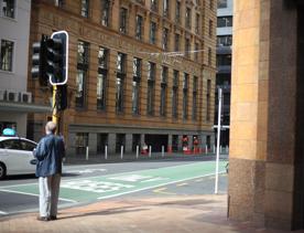 The mix of modern and old buildings along Lambton Quay, including the old supreme court, and old bank.